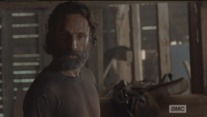 Rick looks down at Aaron, retorts,