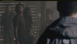 Rick, making no move to reply to Aaron's greeting, regards the stranger a moment more before asking, hoarsely,