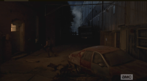 They reach an abandoned looking industrial park...Rick whistles his singsong whistle, and Daryl, who has been outside, keeping watch, waves to them and pounds on the door, signaling the others, inside.