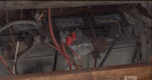 ...a backup battery. Abraham asks Glenn how he knew it was there, and Glenn smiles in a silent homage to Dale. <3