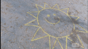 This image hearkens back to happier days, of children playing on playgrounds, running, laughing...living.