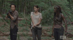 Michonne looks over at Glenn and Maggie.