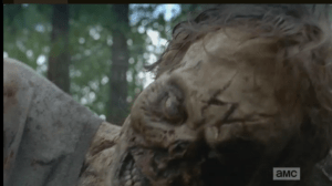 Rick gets stuck in mud and squeals wheels to get out of there, crashing into the red truck in the woods, which contains a large amount of snapping upper torsos with