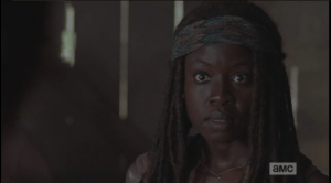 Michonne's face softens.