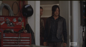 In reply, Aaron brings Daryl to the garage, which is stocked with tools, a motorcycle frame, and many, many parts.  Aaron explains that the frame and the tools were there already, that whoever lived here, before, must have built bikes.  