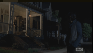 Daryl turns to leave, and Aaron comes out and sees Daryl walking away, calls to him.