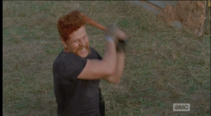 Abraham continues to singlehandedly massacre the oncoming walkers, armed with only a wrench-sized metal stick.