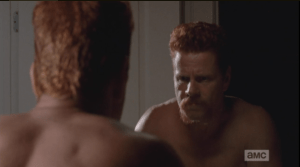 Meanwhile, Abraham stands at the bathroom mirror...