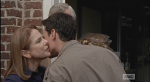 Aiden kisses his mom and bids his father farewell.