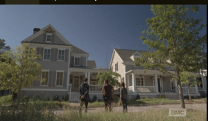 Rick and Carl look at the two huge houses being offered to their group.