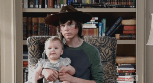 Carl looks up at Deanna.