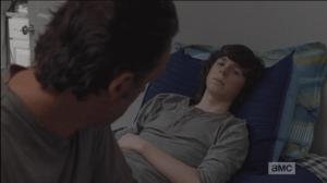 Carl agrees, saying he likes it here, and the people seem super nice...but they're weak. Carl tells his dad that he doesn't want them to get weak like these people, here.