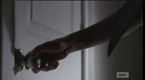 carl at the door, knife