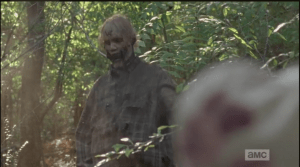 Carol keeps firing bullets into the walker's chest, and finally drops it with a shot to the head. At Rick's questioning look, Carol explains that they said they were going shooting, and she couldn't very well come back with a full mag...