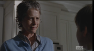 Carol narrows her eyes at Sam, tells him these aren't problems, and besides, she doesn't care...she tries once again to march him to the door.