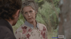 Carol turns to Rick, tells him that