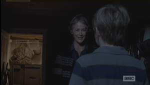 Carol recovers herself quickly, asks Sam what he's doing there. Sam replies that he was hoping she was making more cookies, but... Carol puts on a sunny smile, offers to make Sam a whole batch of cookies, just for him, but he can't tell anybody he saw her there.