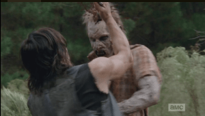 daryl stabs walker