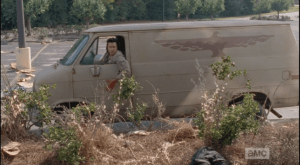 Eugene, who has gotten Tara to the van and who pulls up, slapping the door and calling the walkers away,
