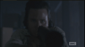 ...and raises his gun with shaking hands. But, before Eugene can pull the trigger...
