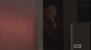 ...and the next shot we see is of Eugene, peering fearfully out the office door...
