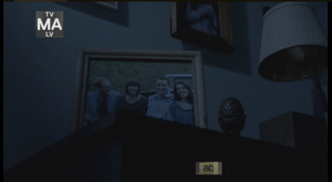 WD Ep 513 opens before the sun rises another day in Alexandria: Vanilla Dream. In the predawn darkness, we see framed pics of white people arm in arm, or trying to look casual and unscripted while posturing themselves in wacky antics for the camera.