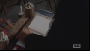 ...until he has torn away all the pages, leaving the spine and back cover of the bible.