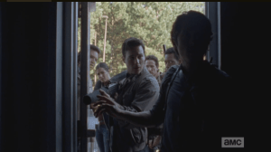 The gang enters the warehouse cautiously, led by Glenn, who bangs his hand on the door to draw any walkers inside the buiding to them. But all is quiet.