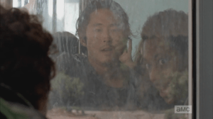 Glenn and Noah look at Nicholas, urge him to hold the door steady...they know he is about to bail, and this only works if everyone does his part, keeps the doors steady...if Nicholas bolts for it, pushing the doors to escape outside, he presses them into the walkers inside...Glenn tries to talk Nicholas down,