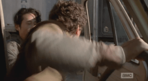 Glenn runs up and grabs Nicholas out of the van...