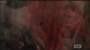 Shut inside the glass doors, Glenn must watch Noah's savage demise.