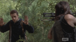 Meanwhile, as Daryl prowls through the woods, crossbow in hand, he hears and noise, whirls.