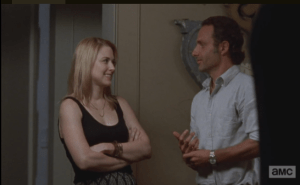 As her D-bag husband walks away, Jessie turns to Rick, arms crossed in front of her, asks,