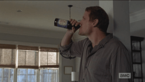 Somewhat mollified, McBeaty takes a swig of his beer.