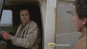 Eugene looks at Nicholas, turns off the engine, and begins to step out of the van, despite Nicholas's orders to get back in.