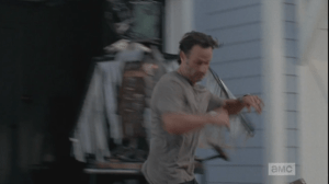 Mid wack-attack, Rick crashes some big weird metal thing in a driveway.