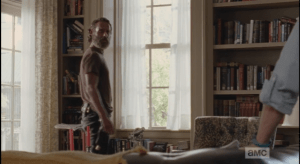 Rick turns to face Deanna.