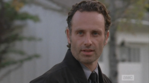 ...and we see a glimpse of our favorite madman, Rick Smash!  He no likey seeing another man's arm around his woman...