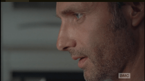 Watching McBeaty's retreating form, Rick thinks a moment.