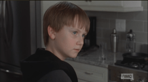 Sam looks at Carol, asks her,