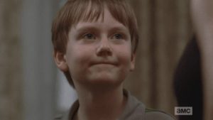 Just then, Jessie's son Sam comes running up, and God bless him, he says there's no more cookies...