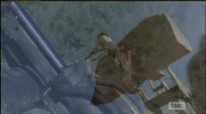 Unfortunately, a stray bullet from Tobin's rifle hits a piston on the excavator's workings, releasing the dumper and sending poor Francine to the ground, hard...