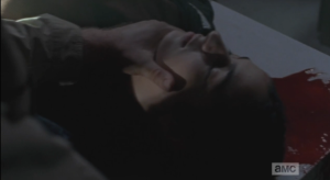We see Tara, unconscious on a table, blood still seeping out of her head wound.