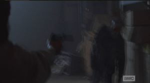 Eugene fires at the walker...
