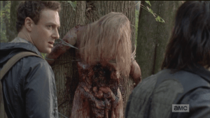 Aaron turns to Daryl.