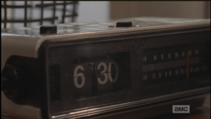 In the next scene, we see an alarm clock strike 6:30 am...