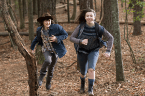 In a beautiful slow-motion sequence, set to a dreamy  Bear McCreary score, we see the young people run through the woods, happy and free.  Young love and innocence shining through, even in these dark times.