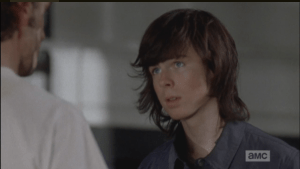 Carl looks into his dad's eyes.