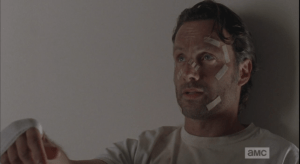 Befre Rick can answer, we hear Carol's voice chime in, quickly,