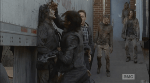 Daryl then spears his knife into a walker that has come up on Aaron. Aaron must be taking notes, because he machetes two walkers upside the head as they run for cover...